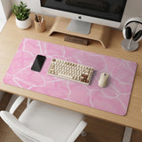 Soft pink desk mat with a kawaii cloud-marble pattern, white crackle lines, and small star accents.