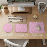 Soft pink desk mat with a kawaii cloud-marble pattern, white crackle lines, and small star accents.