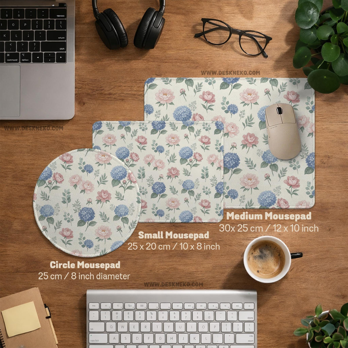 Floral desk mat with sage greenery, pink peonies, blue flowers, and a warm cream background.