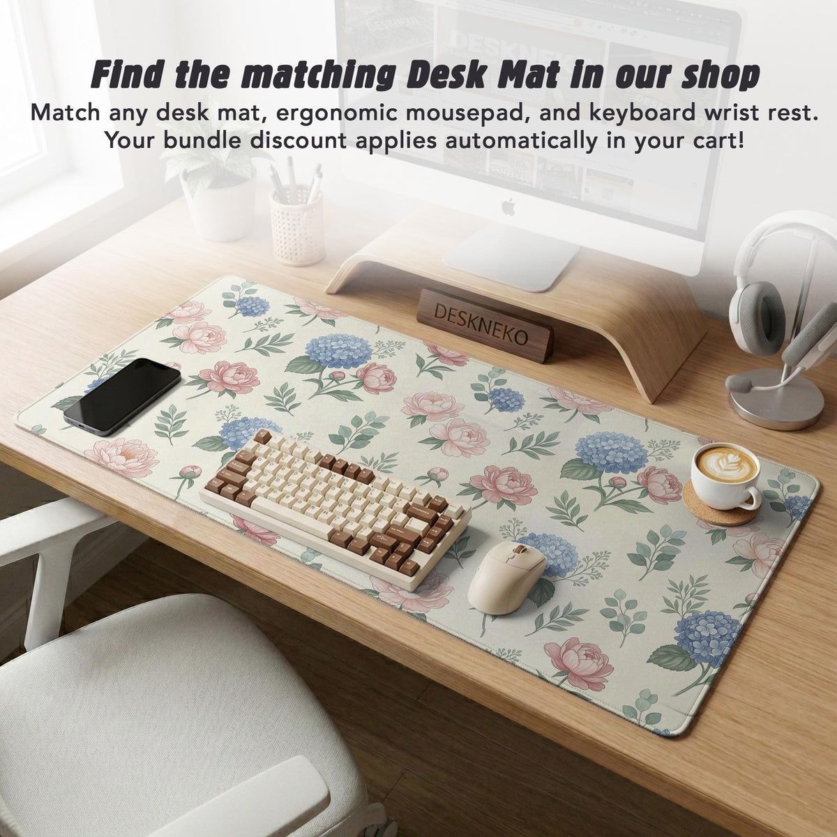 Mousepad and keyboard wrist rest with a floral print of blue hydrangeas, pink peonies, sage leaves, and a cream background.