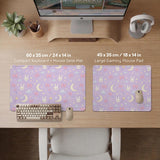 Pastel lavender desk mat with an all-over pattern of bunnies, crescent moons, clouds, bows, stars, and small flowers.