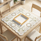 Square mahjong mat with a light floral border in sage green, cream, and blush around a plain center play area.