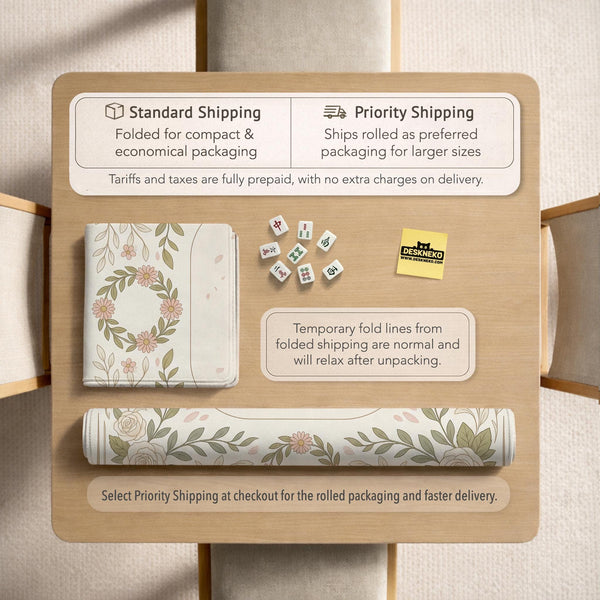 Square mahjong mat with a light floral border in sage green, cream, and blush around a plain center play area.