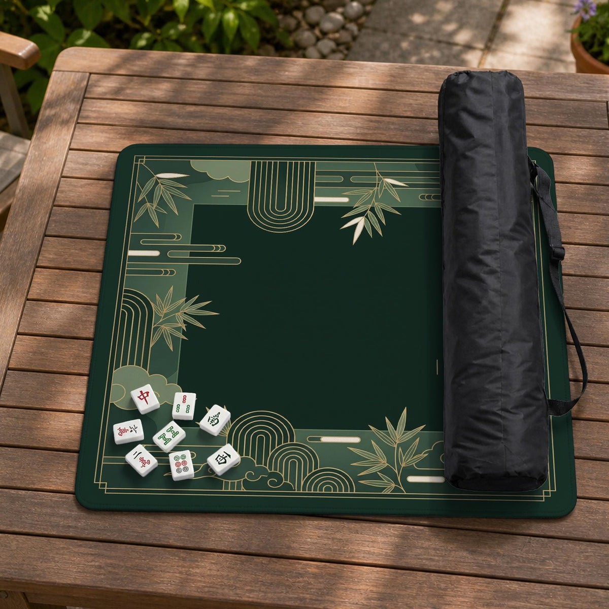 Square emerald green mahjong mat with bamboo line art, gold geometric cloud shapes, and a plain center playing area.