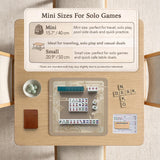 Beige and gold square mahjong mat with a bamboo pattern and geometric border.