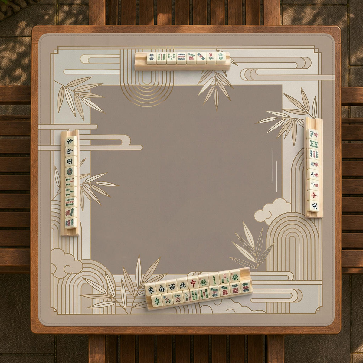 Beige and gold square mahjong mat with a bamboo pattern and geometric border.