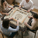 Cream mahjong table mat with a chinoiserie floral border, dark peacocks, soft gold linework, and an open center area.