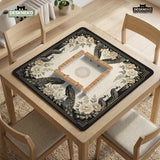 Cream mahjong table mat with a chinoiserie floral border, dark peacocks, soft gold linework, and an open center area.