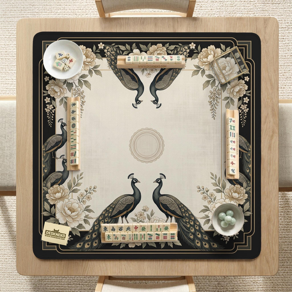 Cream mahjong table mat with a chinoiserie floral border, dark peacocks, soft gold linework, and an open center area.