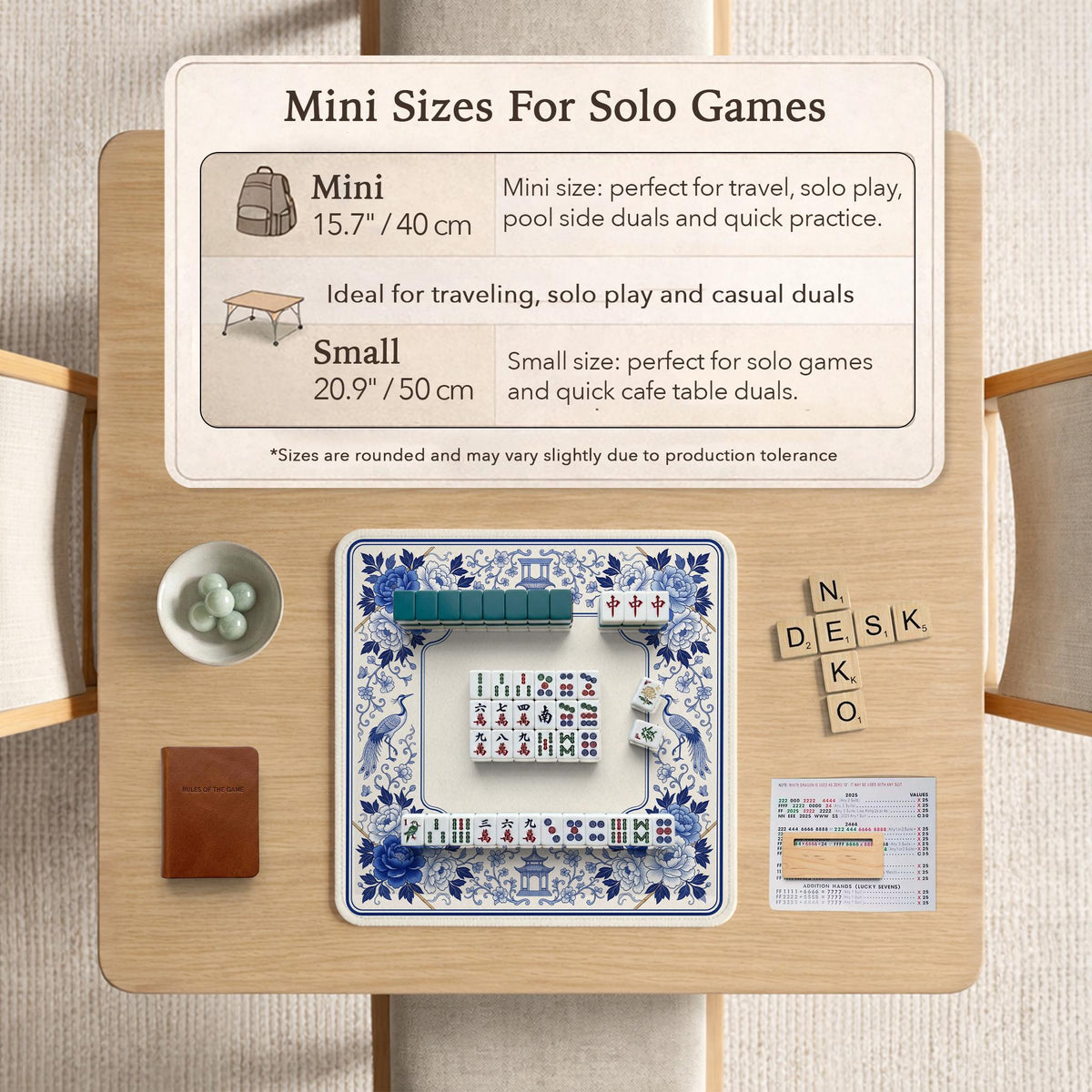 Square blue and white mahjong mat with peonies, cranes, pagoda accents, and chinoiserie linework around a plain center.
