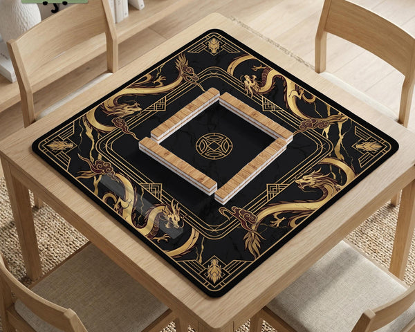 Black mahjong table mat with a gold dragon border, gold geometric corner details, and a clear center play area.