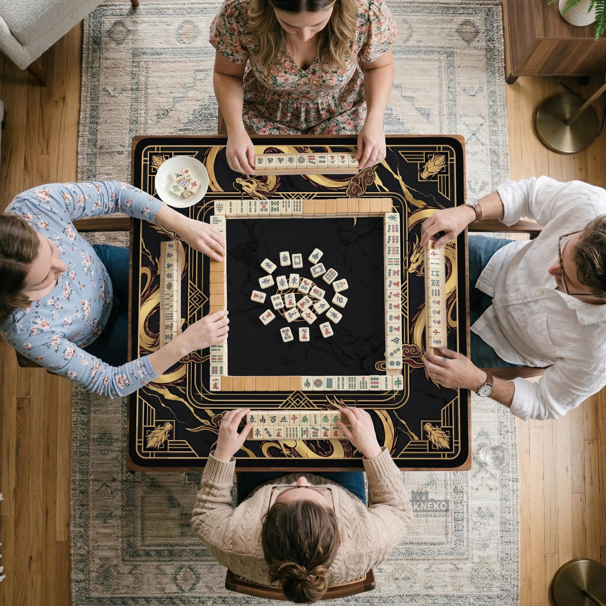 Black mahjong table mat with a gold dragon border, gold geometric corner details, and a clear center play area.