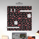 Black pegboard panels with red cloud pattern, shown with hooks, shelves, containers, clips, and a letter holder.