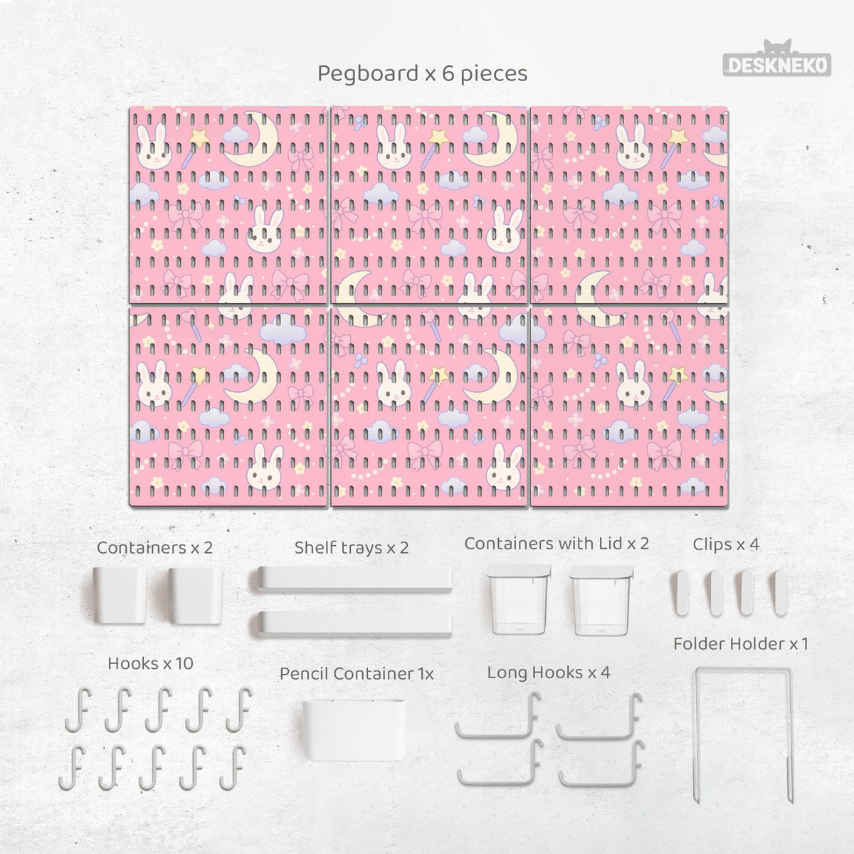 Pink pegboard panels with a kawaii bunny, cloud, moon, bow, and star pattern shown as a wall organizer set.