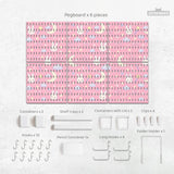 Pink pegboard panels with a kawaii bunny, cloud, moon, bow, and star pattern shown as a wall organizer set.
