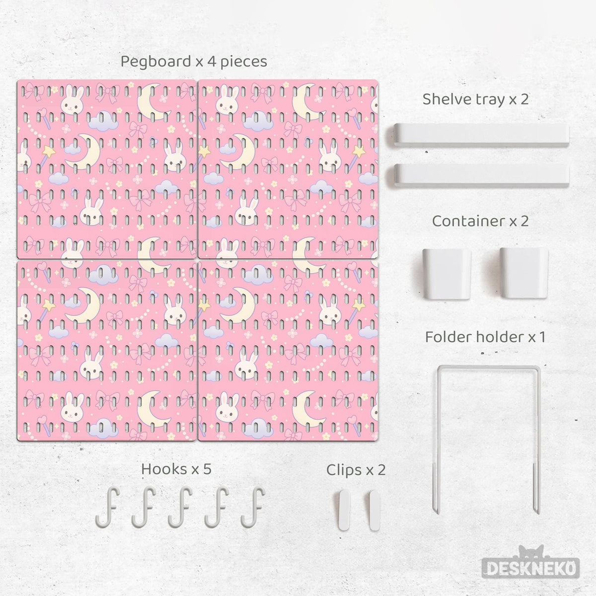 Pink pegboard panels with a kawaii bunny, cloud, moon, bow, and star pattern shown as a wall organizer set.