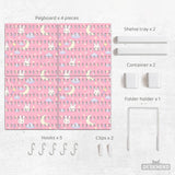 Pink pegboard panels with a kawaii bunny, cloud, moon, bow, and star pattern shown as a wall organizer set.