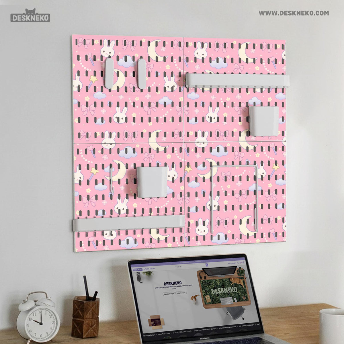 Pink pegboard panels with a kawaii bunny, cloud, moon, bow, and star pattern shown as a wall organizer set.