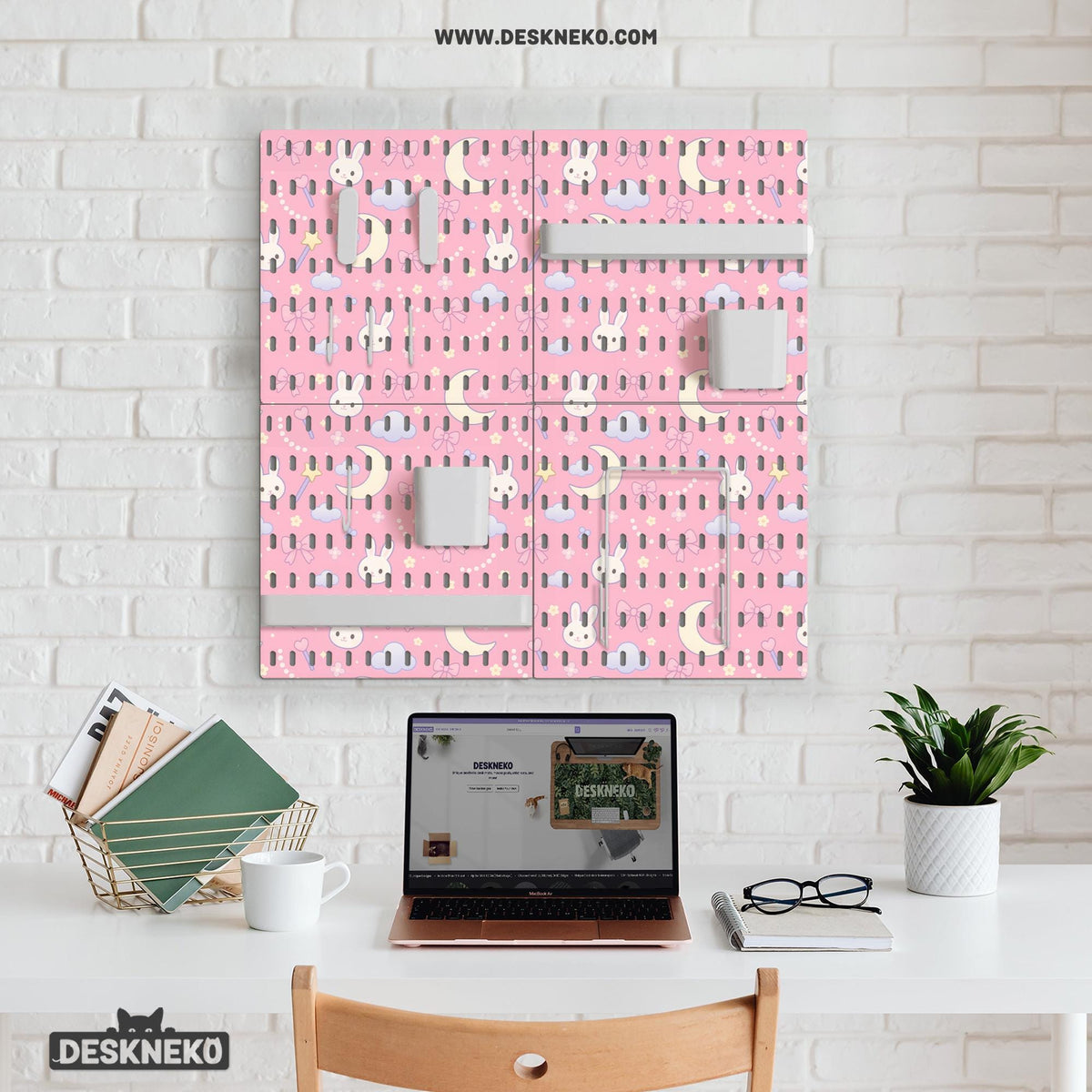 Pink pegboard panels with a kawaii bunny, cloud, moon, bow, and star pattern shown as a wall organizer set.