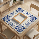 Blue and white mahjong mat with cranes, floral porcelain-style artwork, a cream center area, and a decorative border.