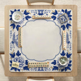 Blue and white mahjong mat with cranes, floral porcelain-style artwork, a cream center area, and a decorative border.