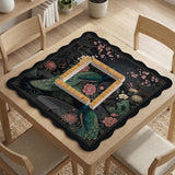 Square black mahjong mat with a gold peacock, blush flowers, and dark botanical artwork on a dark background.