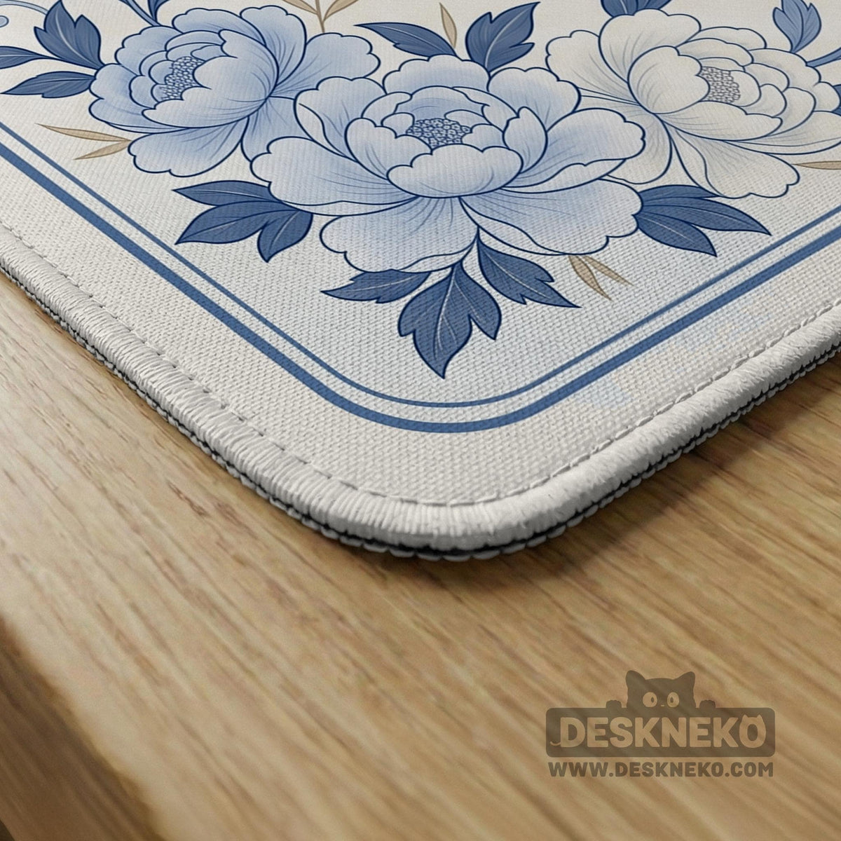 Square mahjong mat with a blue chinoiserie floral pattern on a light background.