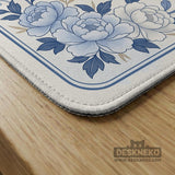 Square mahjong mat with a blue chinoiserie floral pattern on a light background.