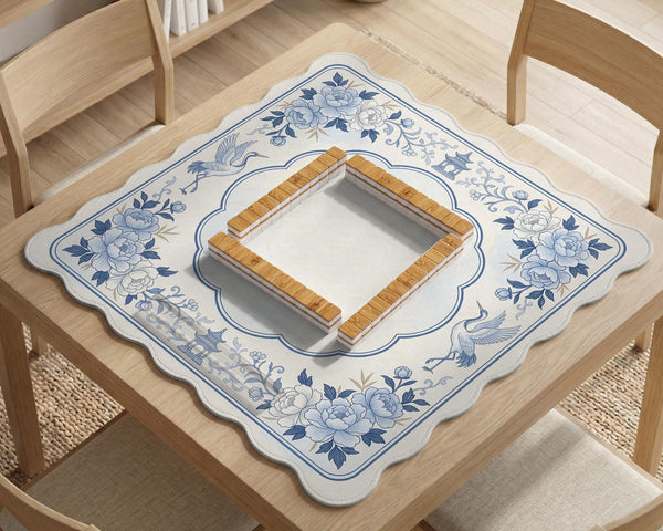 Square mahjong mat with a blue chinoiserie floral pattern on a light background.