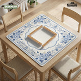Square mahjong mat with a blue chinoiserie floral pattern on a light background.