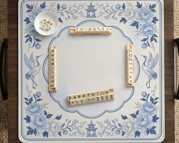 Square mahjong mat with a blue chinoiserie floral pattern on a light background.