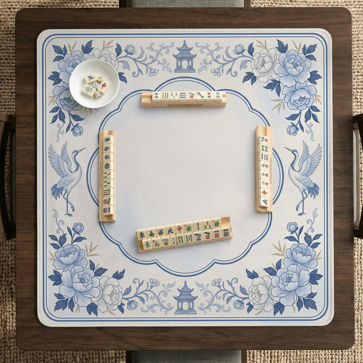 Square mahjong mat with a blue chinoiserie floral pattern on a light background.