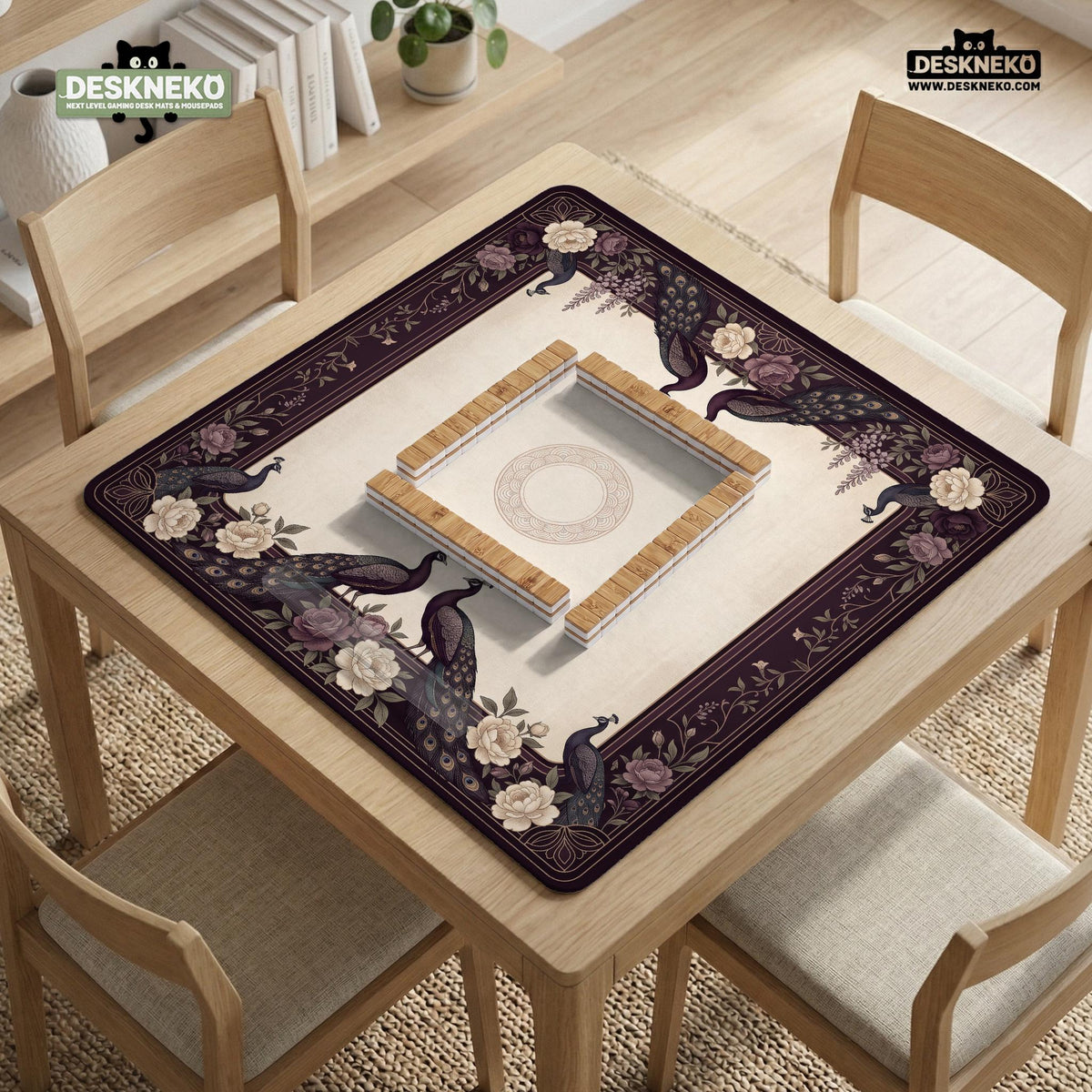 Square mahjong mat with a dark plum border, ivory floral pattern, muted sage leaves, and a decorative peacock garden design.