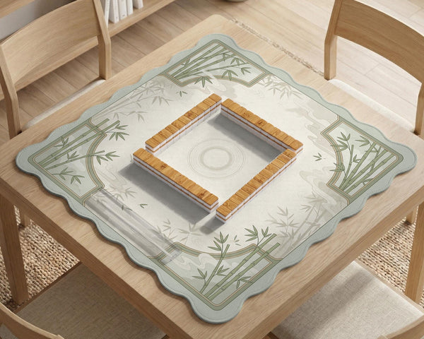 Square light green mahjong mat with bamboo stalks, soft ivory details, botanical shadows, mist lines, and a circular center design.