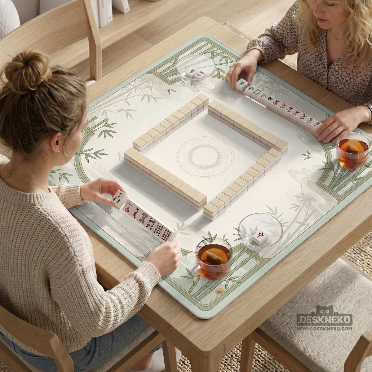 Square light green mahjong mat with bamboo stalks, soft ivory details, botanical shadows, mist lines, and a circular center design.