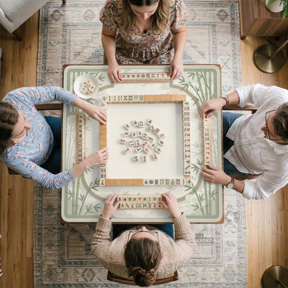 Square light green mahjong mat with bamboo stalks, soft ivory details, botanical shadows, mist lines, and a circular center design.
