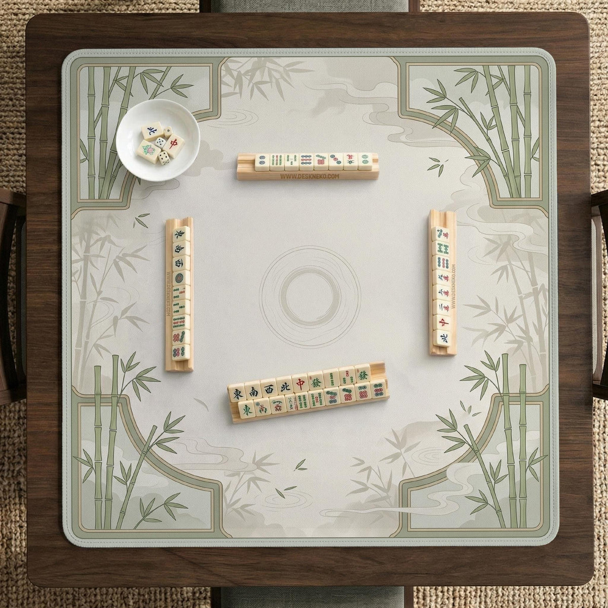 Square light green mahjong mat with bamboo stalks, soft ivory details, botanical shadows, mist lines, and a circular center design.