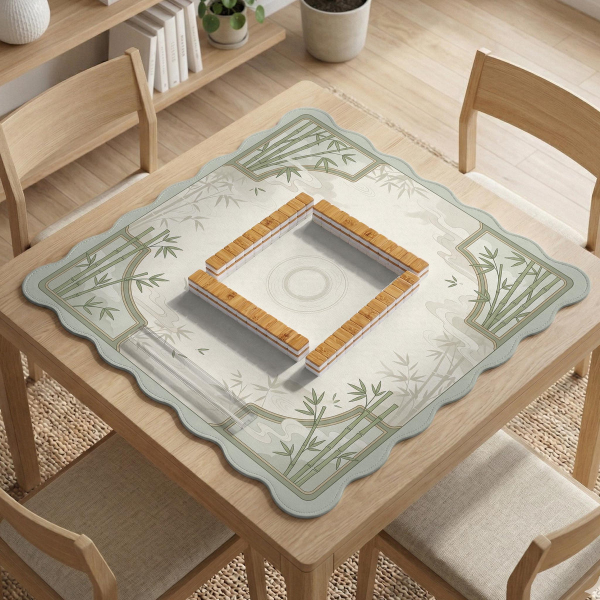 Square mahjong table mat with a pale cream center and green bamboo chinoiserie corners and border.