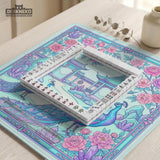 Pastel aqua mahjong table mat with peacock birds, pink flowers, pavilion details, and ornate floral linework.