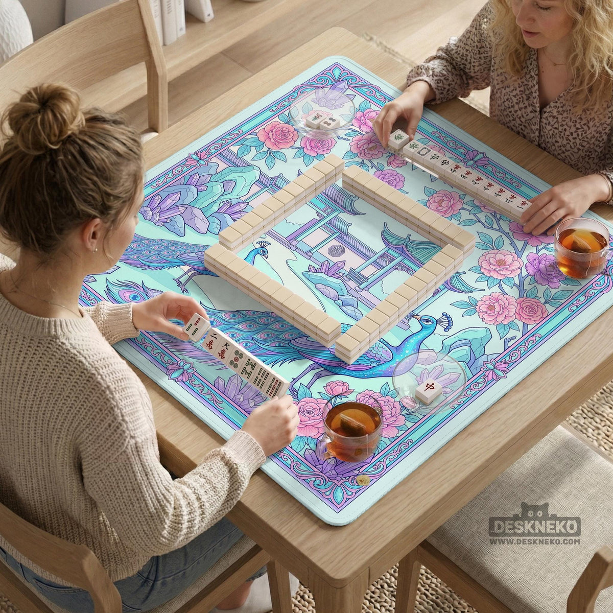 Pastel aqua mahjong table mat with peacock birds, pink flowers, pavilion details, and ornate floral linework.