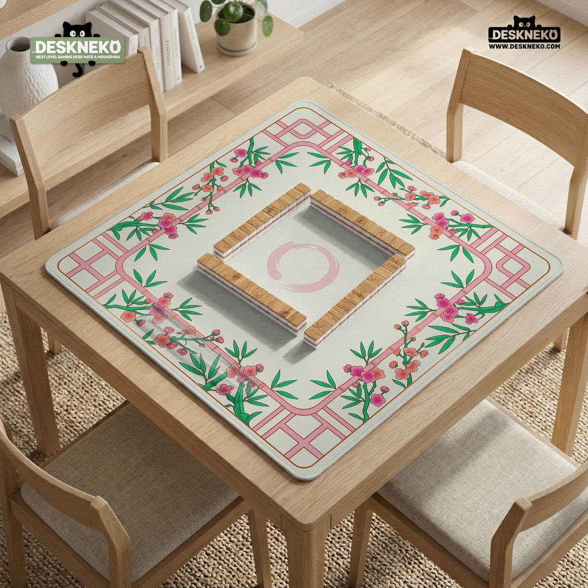 Pink cherry blossom floral mahjong table mat with a cream center and bamboo-style border design.