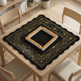 Black and gold square mahjong mat with a scalloped edge, geometric border, thin line details, fan motifs, and dragon and phoenix accents around an open center.
