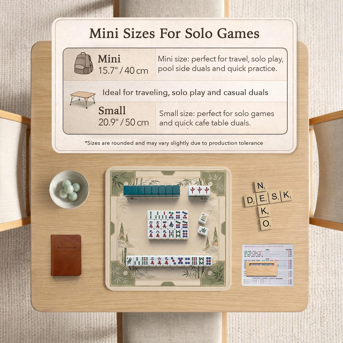 Square mahjong mat with a sage green bamboo and mountain design, cream center, scalloped border details, and gold line accents.