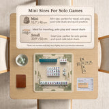 Square mahjong mat with a sage green bamboo and mountain design, cream center, scalloped border details, and gold line accents.