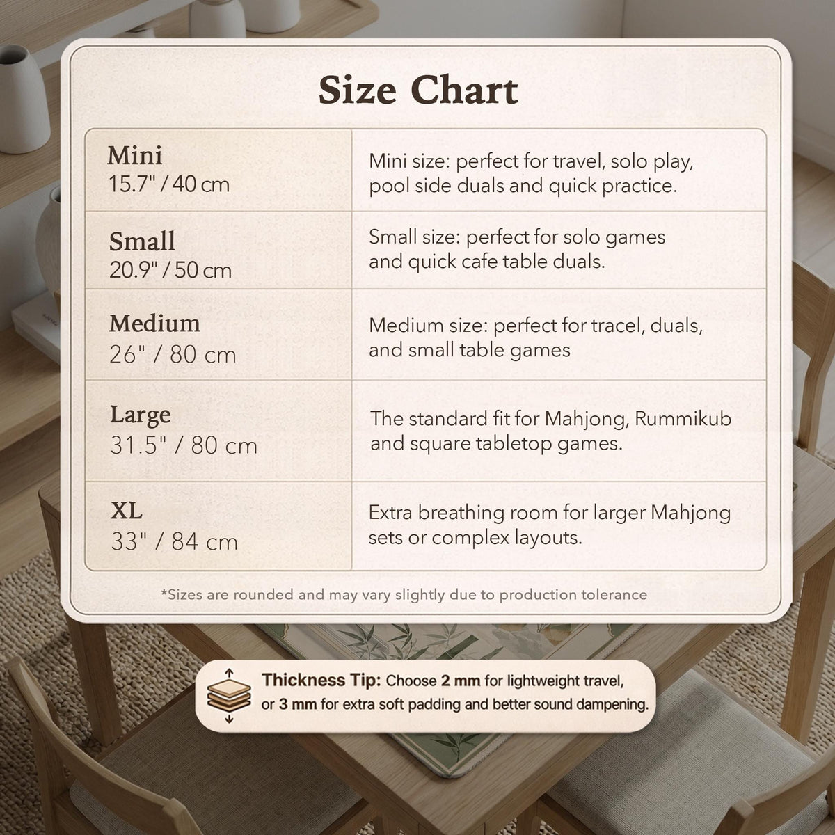 Square mahjong mat with a sage green bamboo and mountain design, cream center, scalloped border details, and gold line accents.