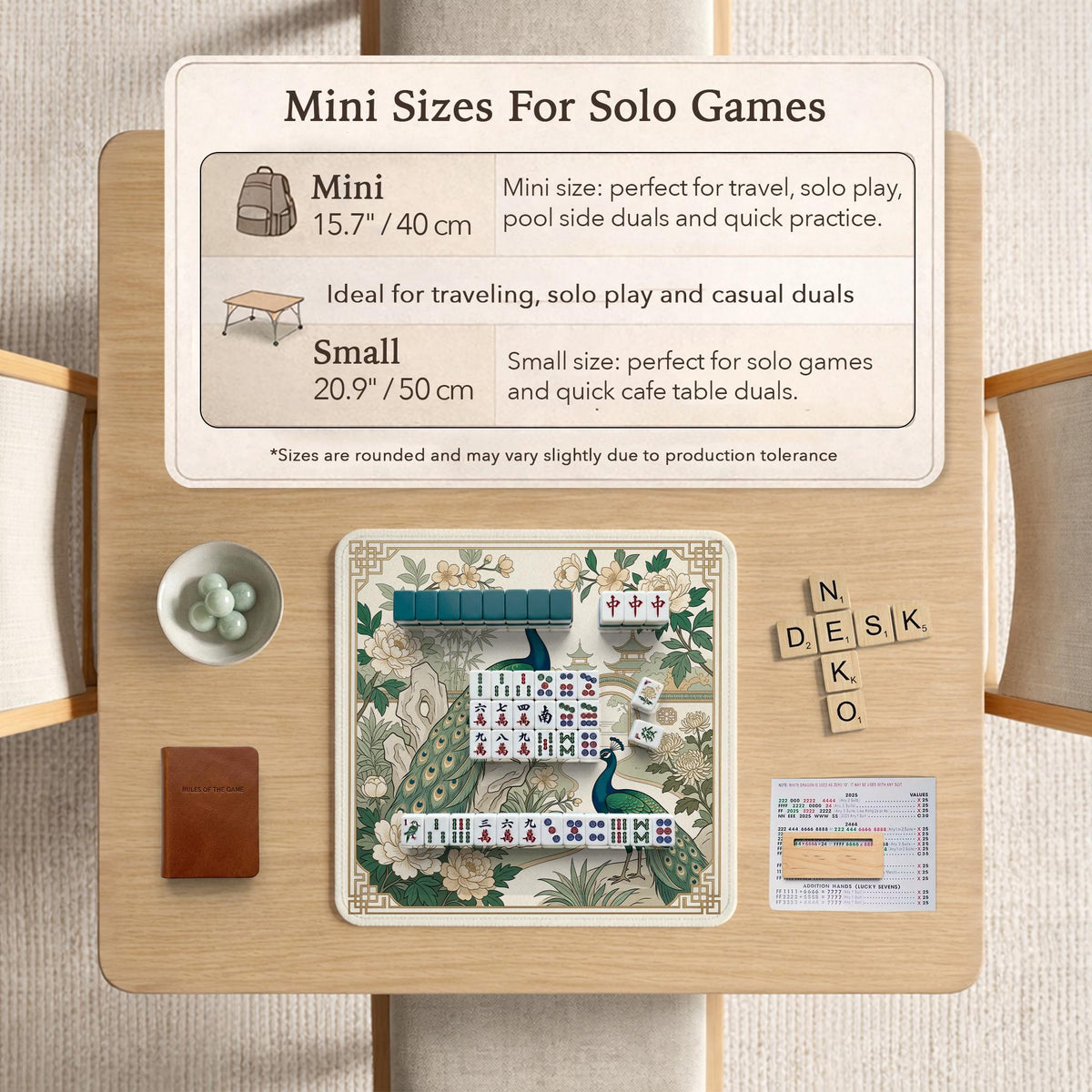 A green mahjong mat with peacock, floral, bamboo, pagoda, and gold border artwork in a scalloped chinoiserie style.