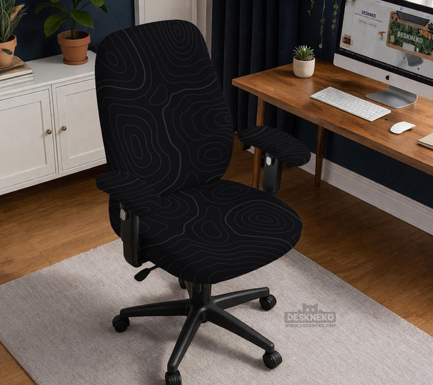 Black chair cover with a thin line art pattern on a gaming chair, shown with a high back and armrest areas covered.