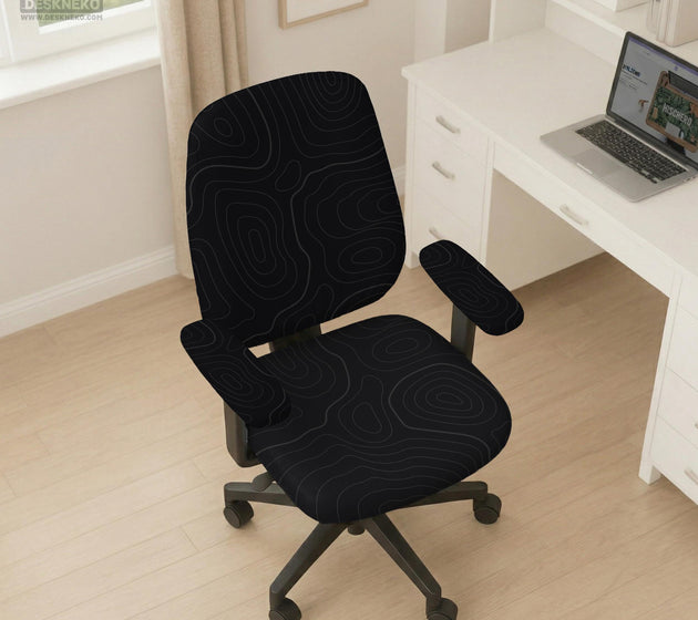 Black chair cover with a thin line art pattern on a gaming chair, shown with a high back and armrest areas covered.