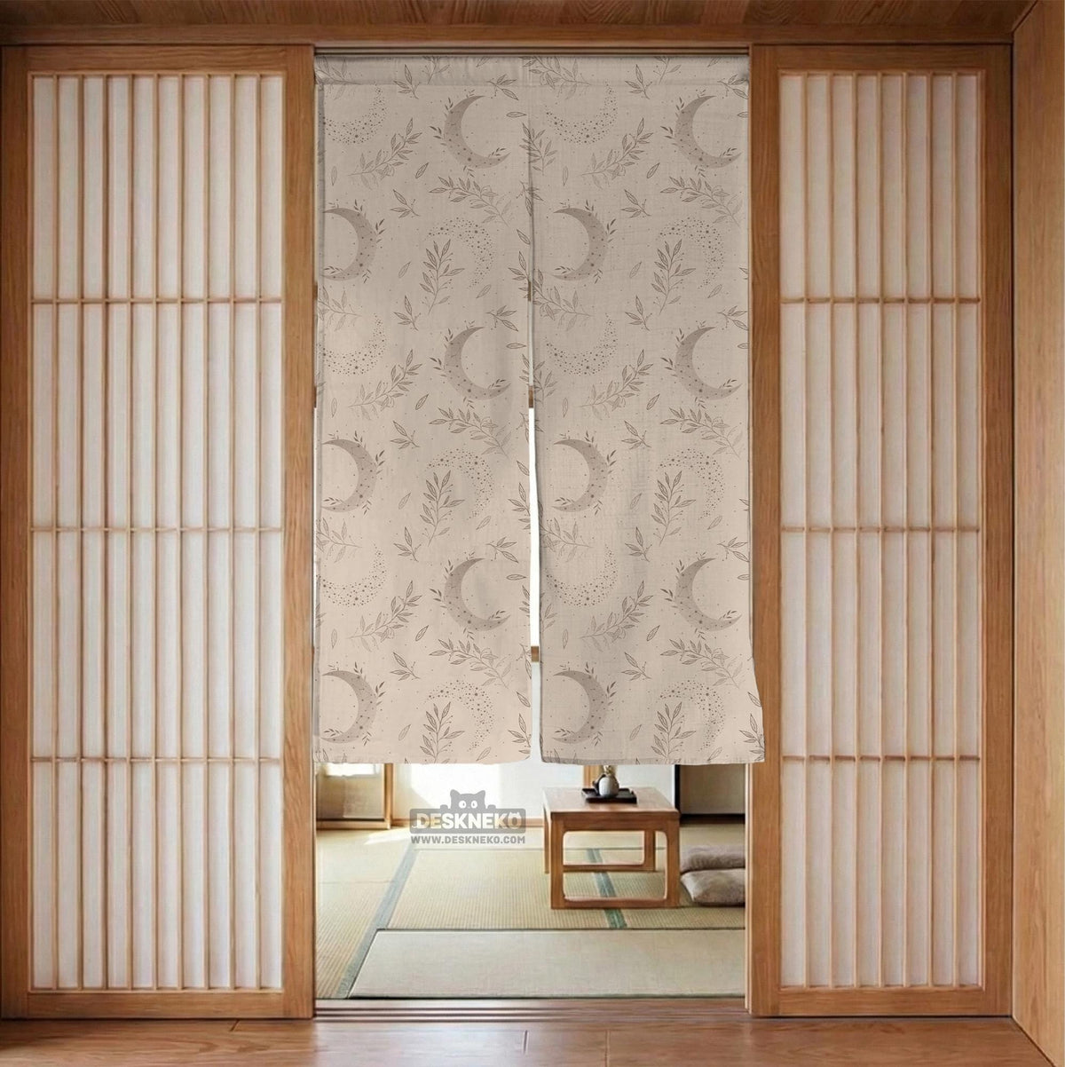 Beige door curtain with a crescent moon, leafy botanical branches, gray line art, and dotted celestial details.