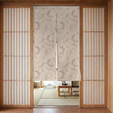 Beige door curtain with a crescent moon, leafy botanical branches, gray line art, and dotted celestial details.